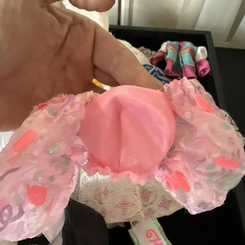 Lotof Barbie doll clothesincluding 1‎ gown, o1 purse, a tuxedo Coat shirt, &more